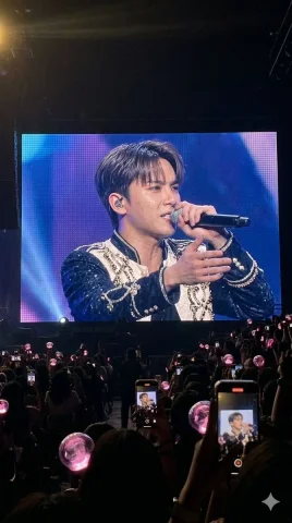 Passionate singer performs on massive Jumbotron screen for excited crowd — Nano Banana 2 AI Prompt: A vibrant series of concert photos capturing a male performer singing passionate...