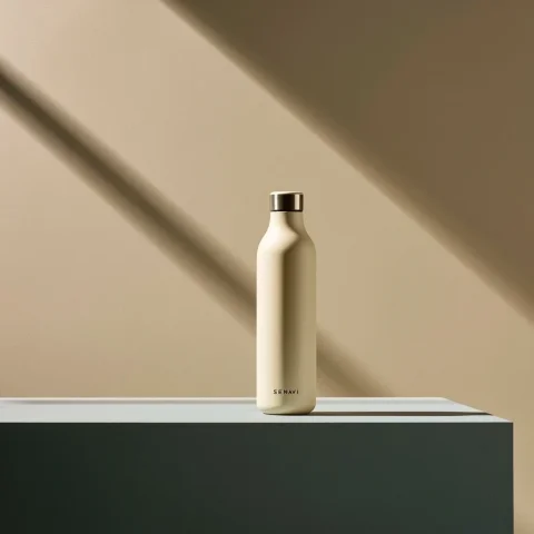 Luxury Insulated Bottle — Nano Banana 2 AI Prompt: Luxury insulated bottle for women, Bali cream color, soft matte finish, minimali...