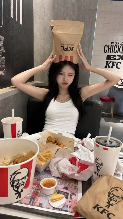 Playful Fast-Food Moment in KFC Booth