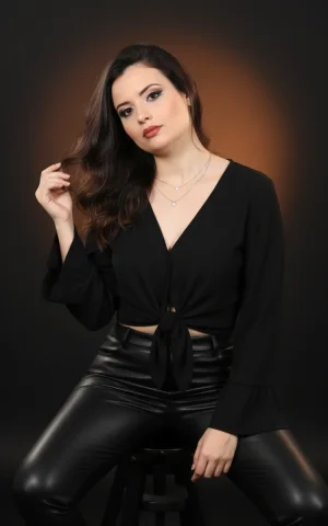 A High-Resolution Studio Portrait Capturing A Confident And Styli — Nano Banana Pro AI Prompt: A high-resolution studio portrait capturing a confident and stylish female figur...