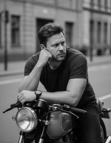 A Black-And-White Portrait With A Rugged, Cinematic Aesthetic Cap — Nano Banana Pro AI Prompt: A black-and-white portrait with a rugged, cinematic aesthetic captures a male fi...