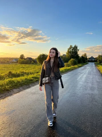 Golden Hour Walk on a Wet Countryside Road — Nano Banana 2 AI Prompt: { "image_generation": { "subject": { "description": "you...