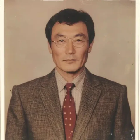 1980s Korean Principal Portrait — Midjourney v6 AI Prompt: An ID photo taken by a school principal in his 60s in Korea in the 1980s wearing...