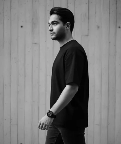 A Cinematic Black And White Portrait Of A Young Man — Nano Banana Pro AI Prompt: A cinematic black and white portrait of a young man (the attached person referen...