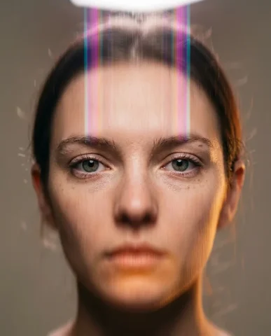 Chromatic Motion-Streak Portrait 4 — Nano Banana AI Prompt: Portrait where the subject looks downward with eyes cast toward the lower left,...