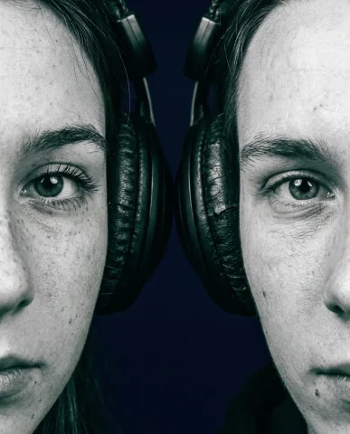 Dual Headphone Portrait 3 — Nano Banana AI Prompt: Natural skin texture with visible pores and micro-imperfections. --ar 4:Medium p...