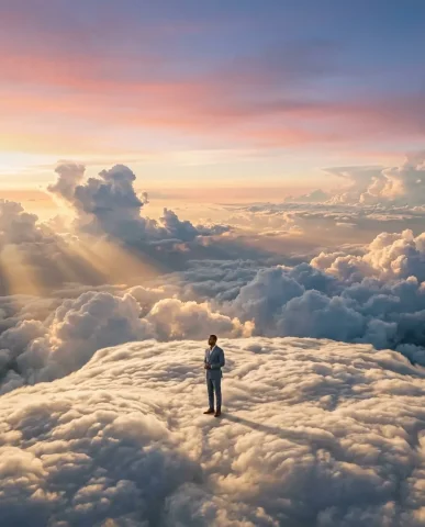 Sitting on Clouds Fashion Portrait 7 — Nano Banana AI Prompt: Wide cloudscape with a tiny figure in a slate-blue suit standing alone on a clou...