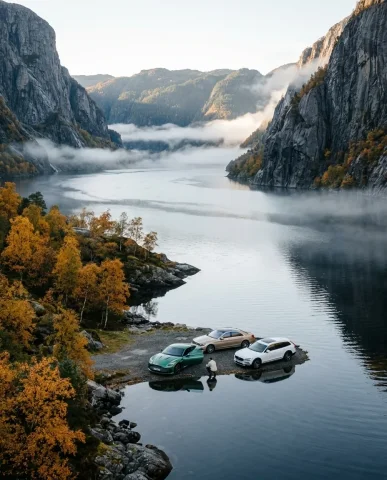 Grand Touring Cars at Misty Norwegian Fjord 3 — Nano Banana AI Prompt: Ultra-realistic overhead aerial perspective of the Norwegian fjord scene. Shot f...