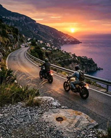 Adventure Motorcycles on Amalfi Coast at Sunset 7 — Nano Banana AI Prompt: Two motorcycles riding away on a winding Amalfi Coast road at sunset, small tail...