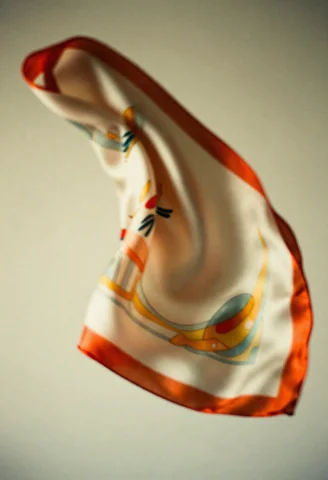 A Silk Scarf Lifting In A Soft Studio Breeze, Shot On Film,... — Stable Diffusion AI Prompt: a silk scarf lifting in a soft studio breeze, shot on film, extreme close-up, no...