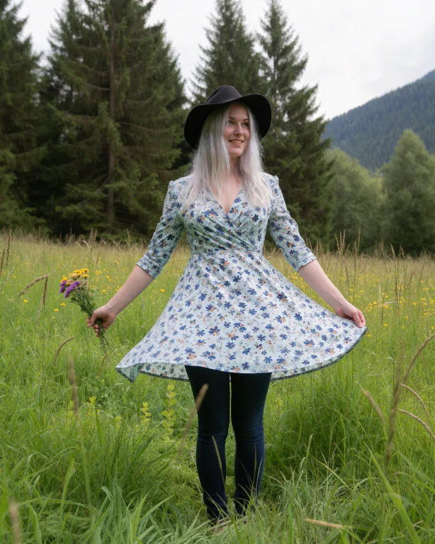 Photograph Of A Young Woman Standing In A Lush, Green Meadow...