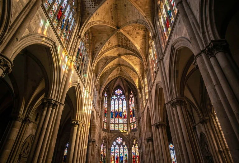 A Gothic Cathedral Interior Lit By Stained Glass, Portrait P...