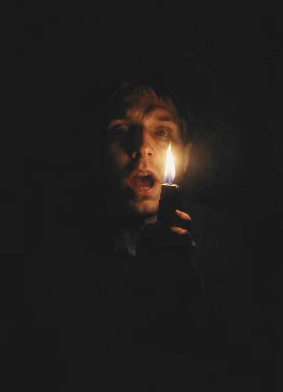 Horror, Shines A Lighter On Himself From Below, Face Lightin...