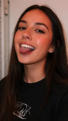 A Young Woman With Long, Straight Dark Brown Hair That Falls... — Stable Diffusion AI Prompt: A young woman with long, straight dark brown hair that falls over her shoulders,...