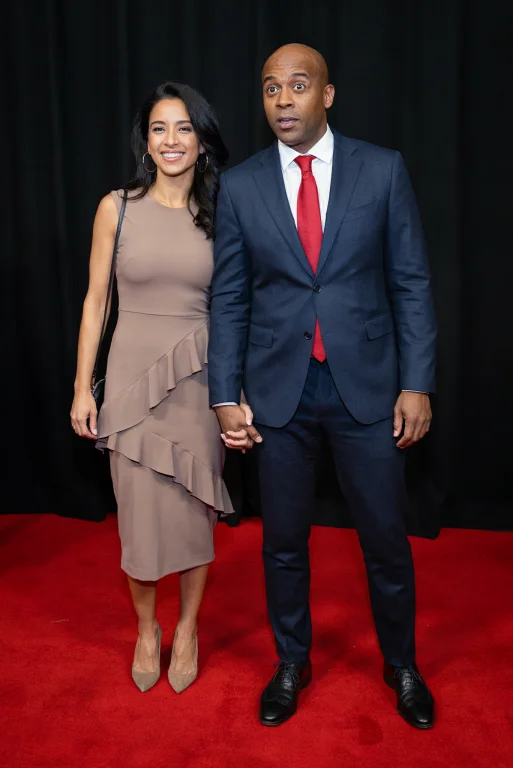 Highleveldescriptionrosa And Cory Walk Hand-in-hand Across A...