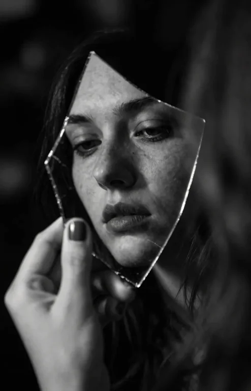 A High-contrast Monochromatic Fine Art Portrait Captures A C...