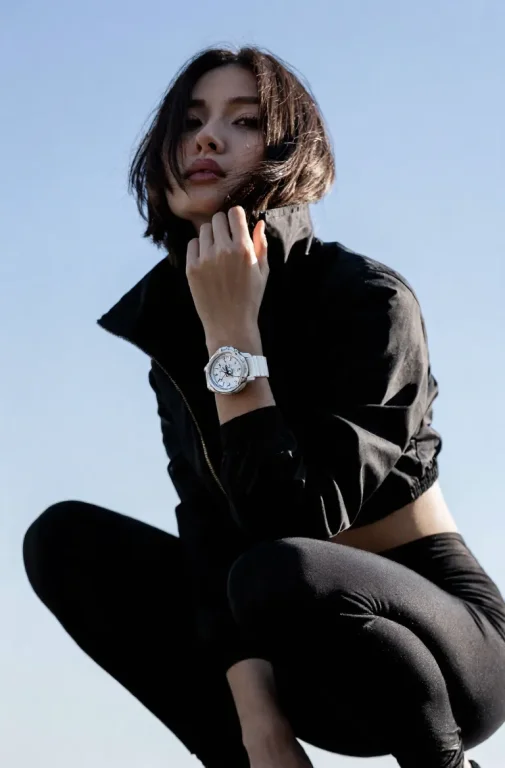 An Extreme Low-angle Fashion Portrait Captures A Young Woman...