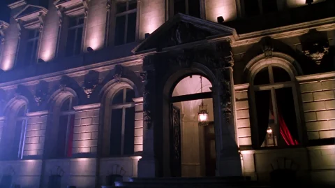 Zlndr2001, A Grand, Ornate Stone Building Facade Is Illumina... — Stable Diffusion AI Prompt: zlndr2001, A grand, ornate stone building facade is illuminated at night, its ar...