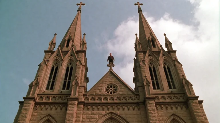 Dgm1999, A Person Stands Atop The Central Gable Of A Grand S...