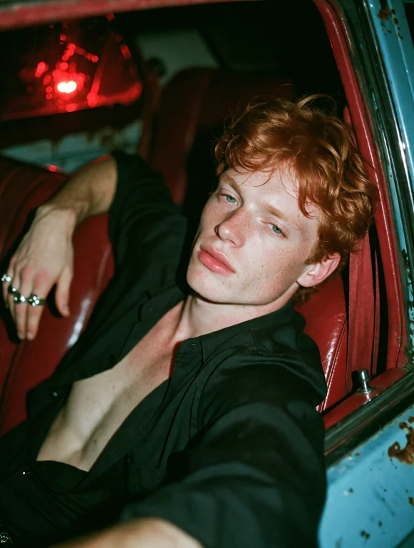 Grin35, Devastatingly Handsome Red-haired Man Reclining In T...