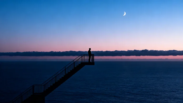 A Silhouetted Figure Stands On An Elevated Diagonal Staircas...
