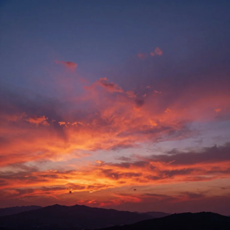 The Thin, Golden-red Clouds Gradually Take On A Deeper Hue....