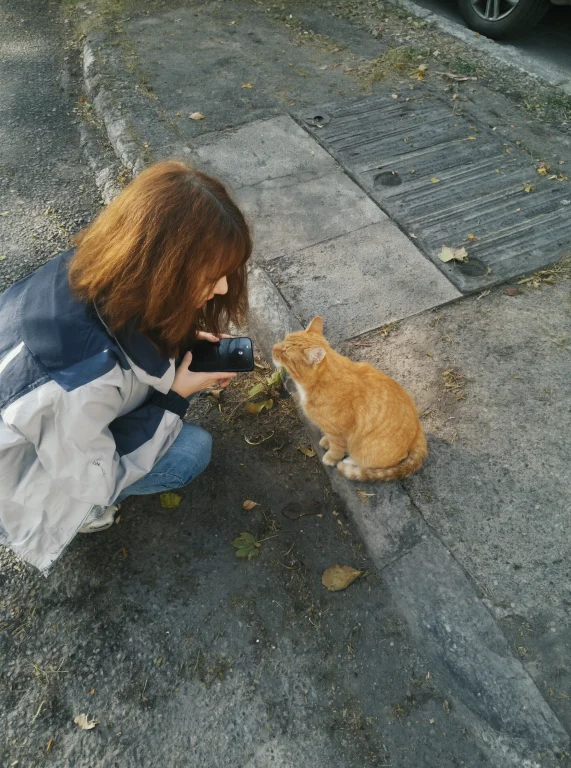 L3n0v0. A High-angle, Outdoor Shot Captures A Young Woman Wi...