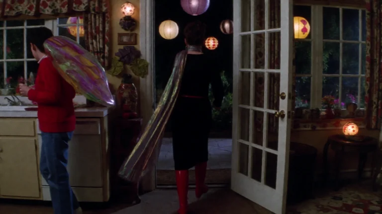 Dnndrk2001, A Woman In A Black Outfit And Red Boots Strides...