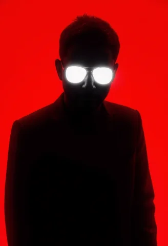 An Enigmatic Silhouette Of A Man, His Entire Face And Head C... — FLUX AI Prompt: An enigmatic silhouette of a man, his entire face and head completely obscured i...