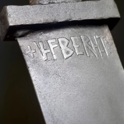 Viking. Viking Age Sword Blade, Close On The Inlaid Inscript... — Stable Diffusion AI Prompt: Viking. Viking Age sword blade, close on the inlaid inscription. The letters lyi...