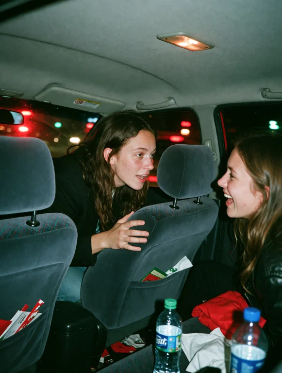 Grin35, Two Friends Squeezed Into The Back Seat Of A Car At...