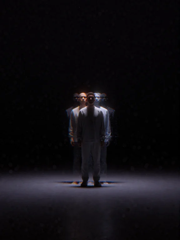 A Solitary Man Standing Motionless In An Empty Architectural...