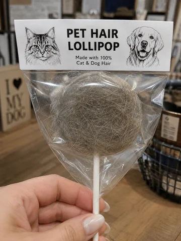 Realistic Product Photography A Lollipop Made Out Of Cat And... — Stable Diffusion AI Prompt: realistic product photography: a lollipop made out of cat and dog hair. Make the...