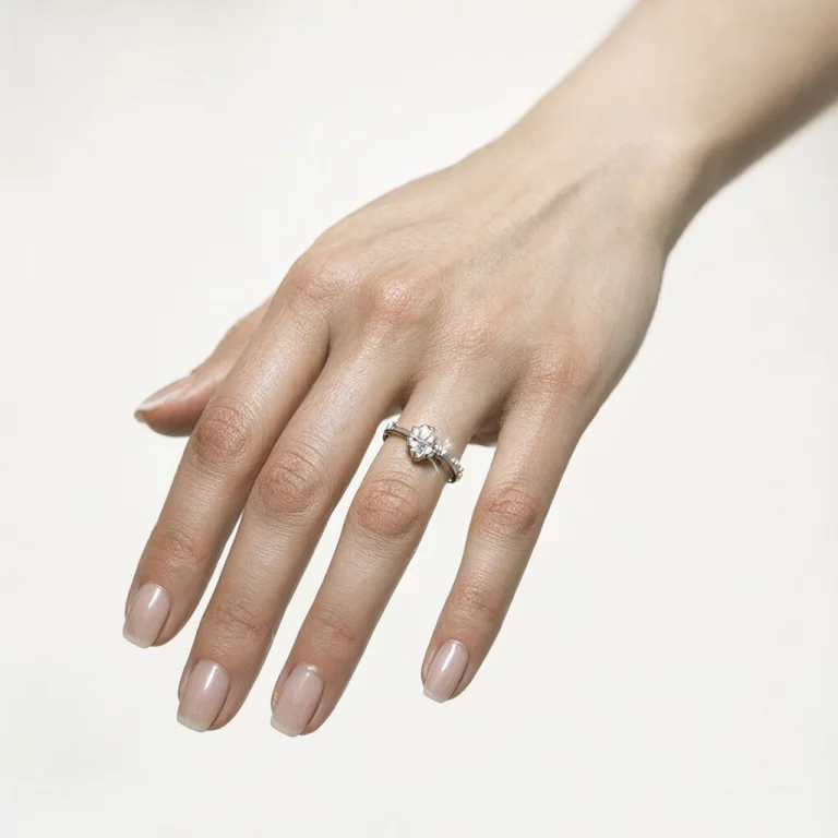 A Womans Hand Reaching Toward The Camera In Extreme Close-up...