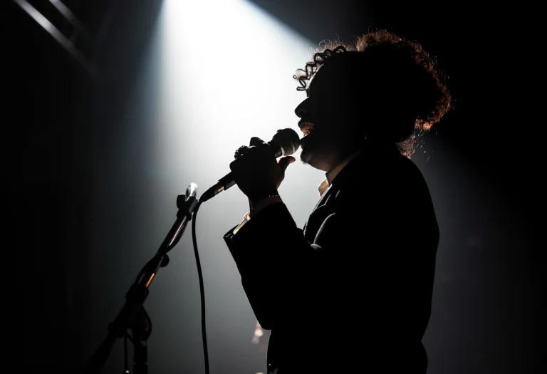 A Jazz Singer Under A Single Stage Spotlight, Backlit Silhou...