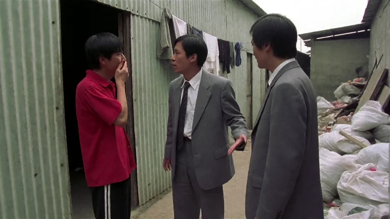 Shlnsccr2001, Three Men Stand In A Narrow Alleyway, Engaged...