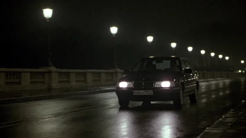 Brnidntty2002, A Black Sedan With A Visible License Plate Is... — Stable Diffusion AI Prompt: brnidntty2002, A black sedan with a visible license plate is driving forward on...