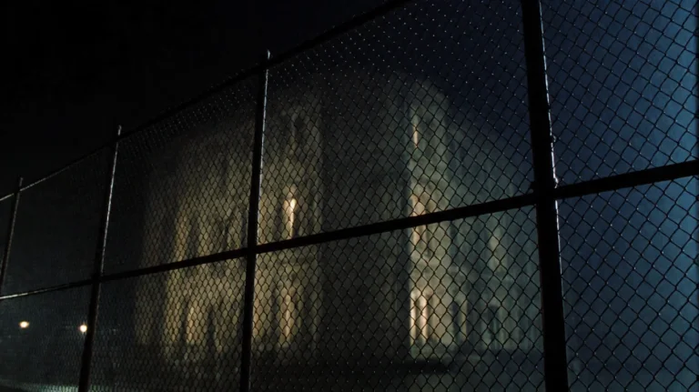 Grnml1999, A Large, Ornate Building Stands Behind A Chain-li...