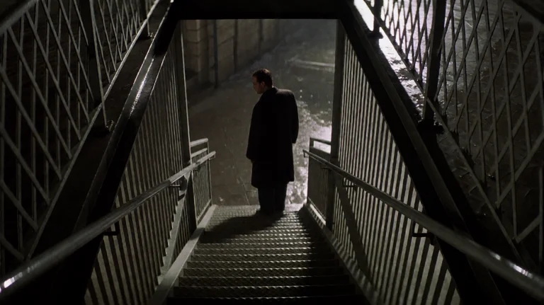 Slrs2002, A Solitary Figure In A Dark Coat Stands At The Top...