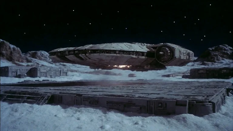 Spcssn21975, A Sleek, Elongated Spacecraft Hovers Just Above...