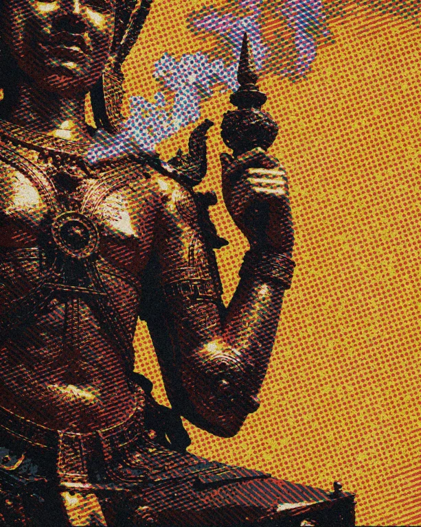 A Golden Ornate Statue Stands Against A Solid Yellow Backgro...