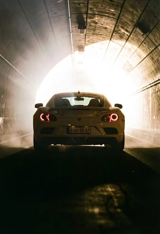 A Sports Car Silhouetted Against A Tunnel Of Light, Film Pho...