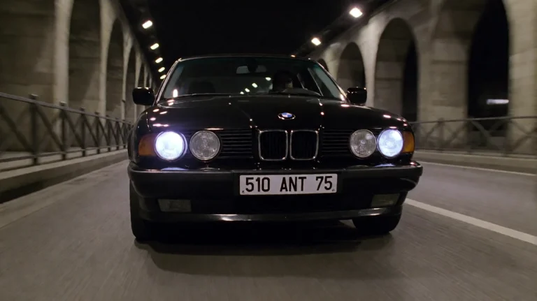 Rnn1998, A Black Bmw Sedan, Its Headlights Blazing White, Sp...