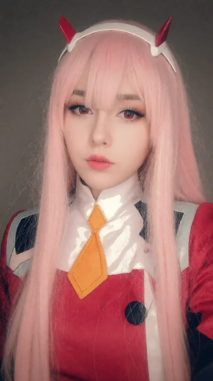 Portrait Of Caucasian Young Woman Zero Two Cosplays, She Has...