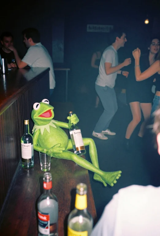 In A Smoke-filled Bar, Kermit The Frog Is Seen Lying On The...