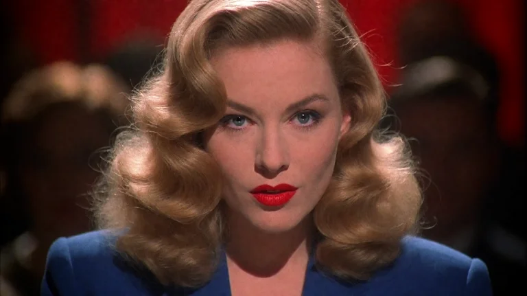 Chcg2002, A Woman With Voluminous, Wavy Blonde Hair And Bold...