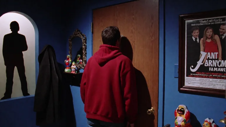 Dthtsmchy2002, A Person In A Red Hoodie Stands At A Wooden D...