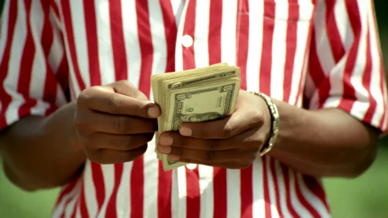 Ctygd2002, A Person In A Red-and-white Striped Shirt Is Hold...