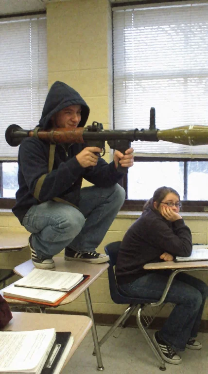 A Candid Snapshot Inside A High School Classroom. A Male Stu...