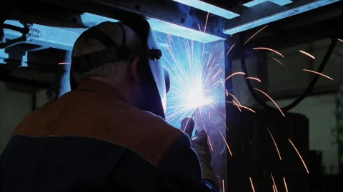 K19wdwmkr2002, A Welder, Viewed From Behind And Slightly To... — Stable Diffusion AI Prompt: k19wdwmkr2002, A welder, viewed from behind and slightly to the side, is intense...